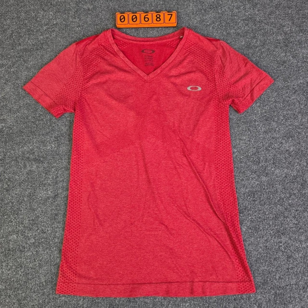 Oakley Women's Red V-Neck Short Sleeve Running T-Shirt with subtle dot pattern